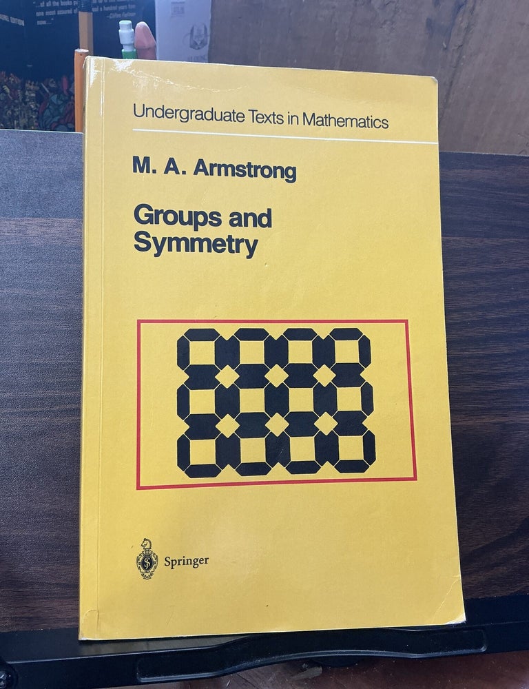 Item #1409 Groups and Symmetry. M. A. Armstrong.