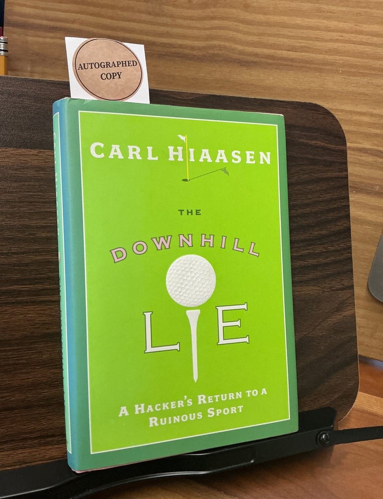 Item #435 The Downhill Lie. Carl Hiaasen.