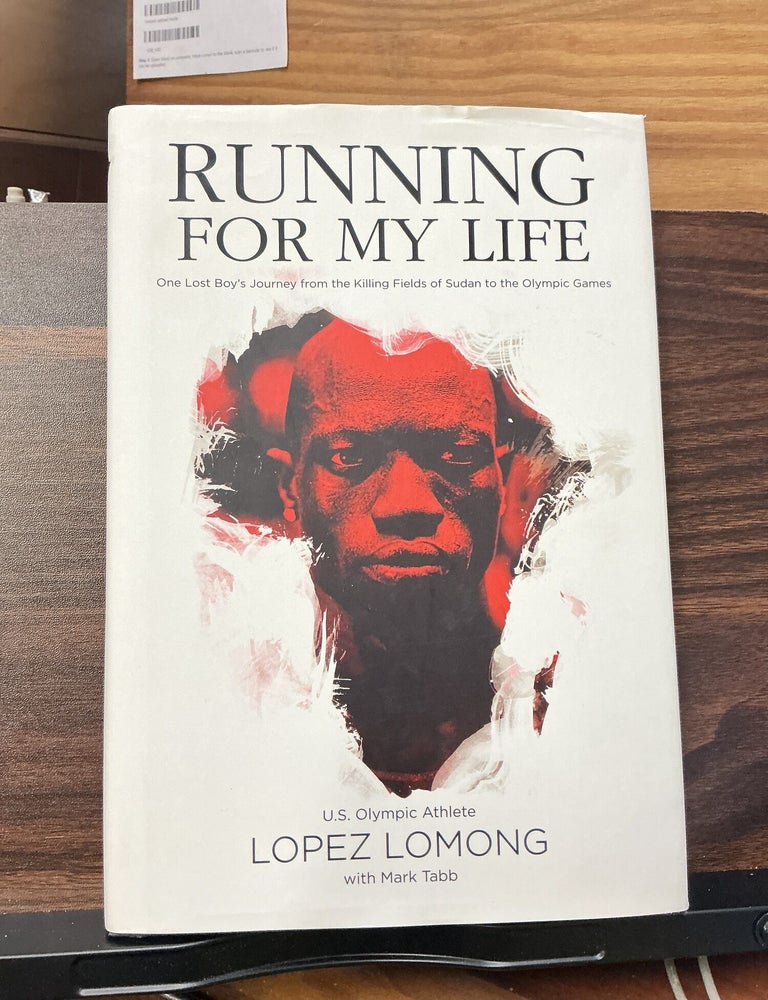 Item #792 Running For My Life. Lopez Lomong.
